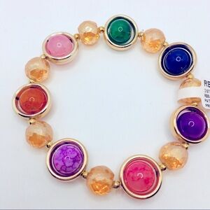 BRACELET MULTI COLORED BEADS IN GOLD TONE SETTING!